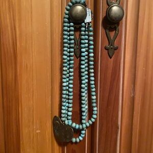 Authentic love tokens turquoise necklace with crystals.